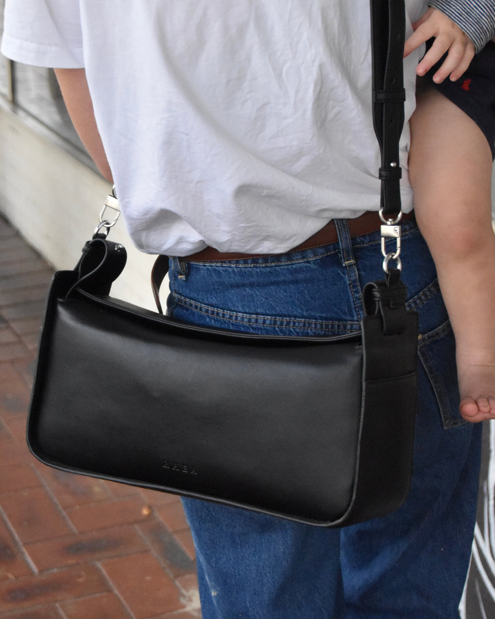 RHEA-Pram-Bag-Black-as-cross-body-bag