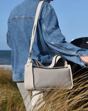 RHEA-Pram-Bag-Oat-Milk-as-cross-body-bag