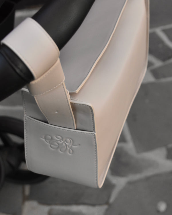 RHEA-Pram-Bag-Oat-Milk-on-pram-handlebars