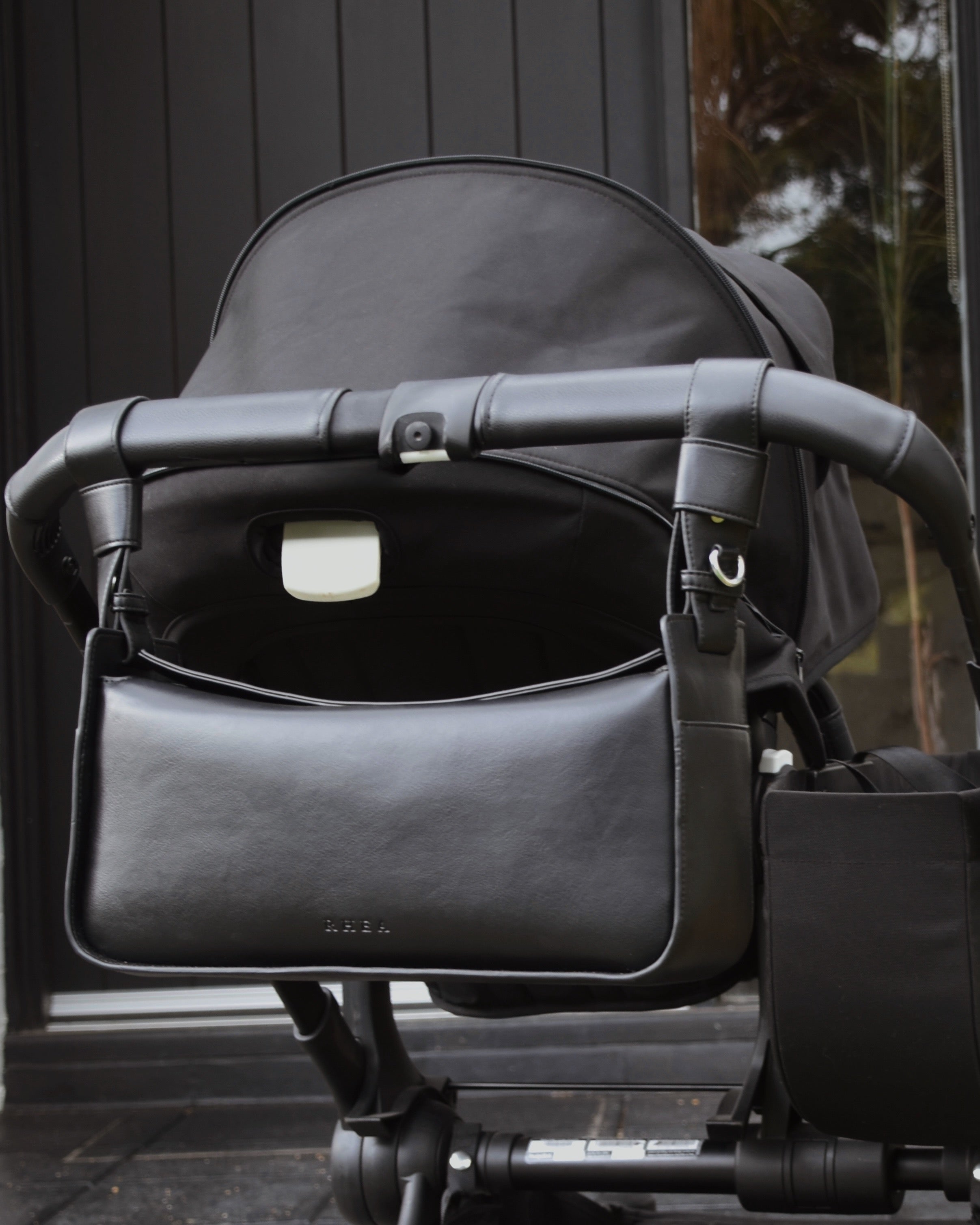 RHEA-Pram-Bag-Black-on-pram 